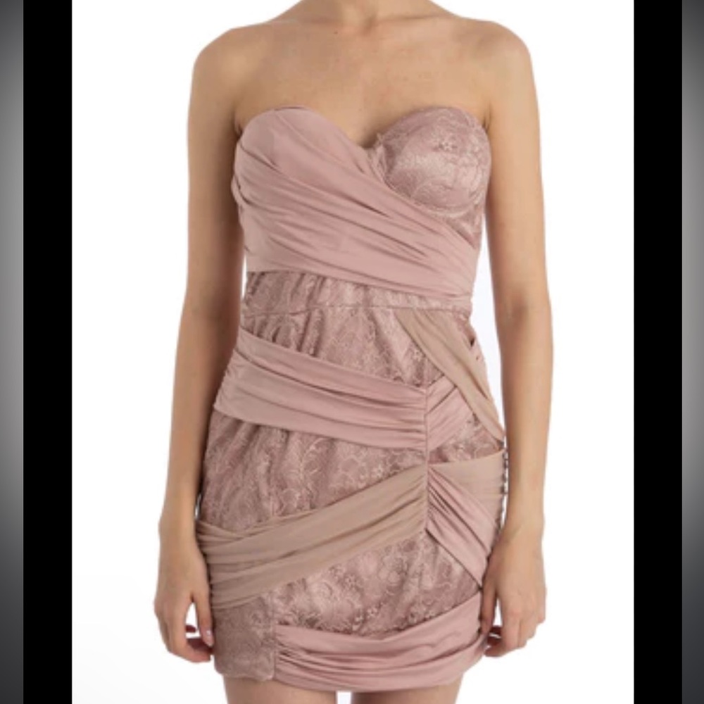 Stunning strapless wrapped dress.